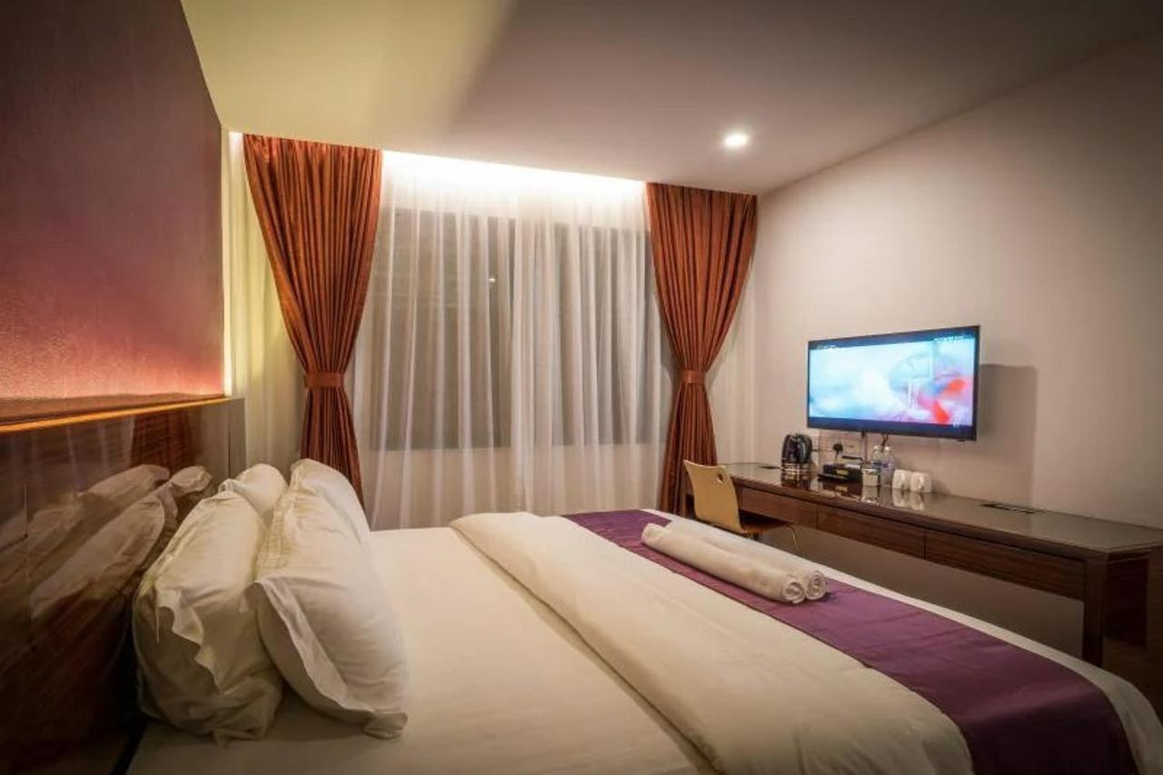 Wiwo Hotel Бинтулу Экстерьер фото